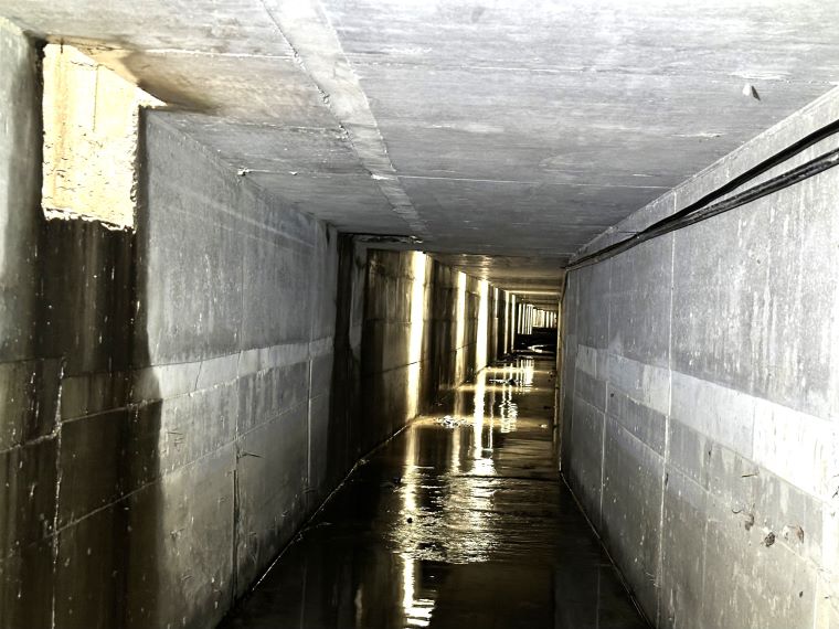 《圖說》佳園路三段增設271公尺的分流箱涵,減少雨水排往佳園路三段145巷內,解決145巷內碗公地形造成的積水情形。〈水利局提供〉